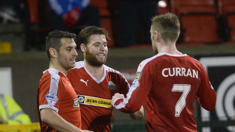 James Knowles is congratulated after scoring Cliftonville's fourth goal in Saturday's 4-2 win against Ballymena United