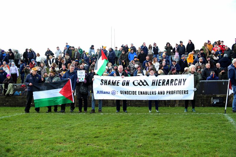 1/2/2026 Gaels Against Genocide in Gaza held a protest at half time on the pitch in Cushendall yesterday in the NHL Div !B game at Cushendall Picture Seamus Loughran
