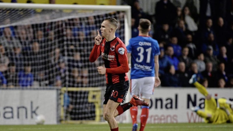 Rory Hale celebrates his winning goal for Crusaders against Linfield last Friday night 