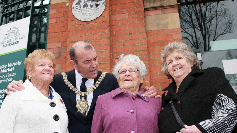 Belfast Lord Mayor Arder Carson with sisters Bridget Pegnam (left), Peggy O&#39;Callaghan (right) and Philomena Henry (centre) from Dublin, who lost their sister Susan Henry in the Blitz. Picture by Bill Smyth 