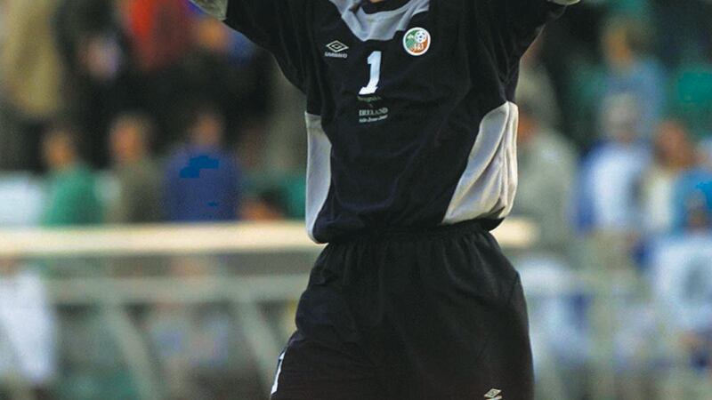 Given celebrating Republic of Ireland's win over Estonia in 2001