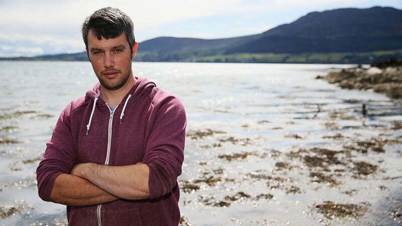 Oyster farmer and owner of Killowen Shellfish Darren Cunningham, at Carlingford Lough in Newry. Shellfish farmers selling tonnes of oysters in Europe have said post-Brexit customs and border ideas are &quot;utterly deluded&quot; and could wipe out their businesses