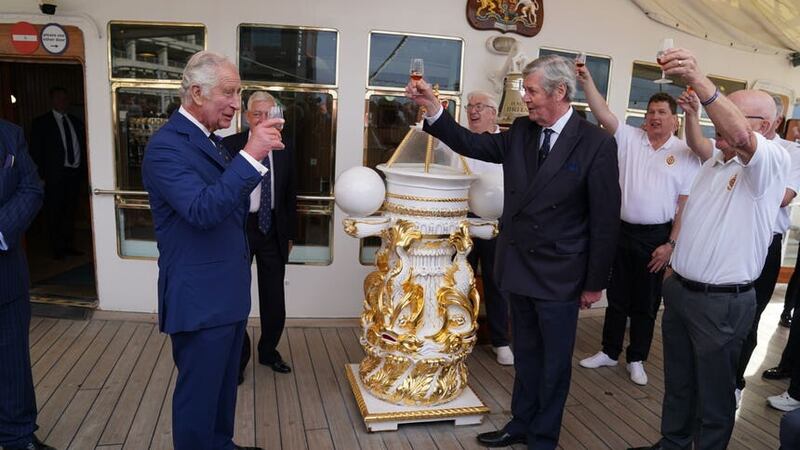 Members of the Royal Yacht Britannia toast the King (Andrew Milligan/PA)