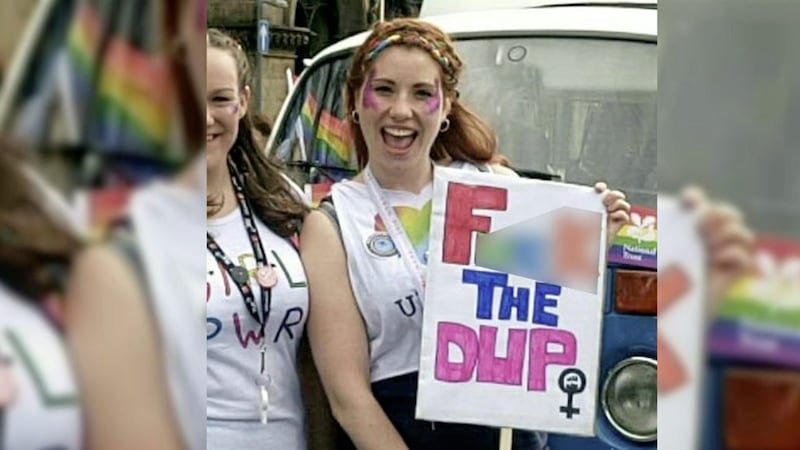 Ellie Evans with her &#39;F*** the DUP&#39; placard during Belfast Pride last year 