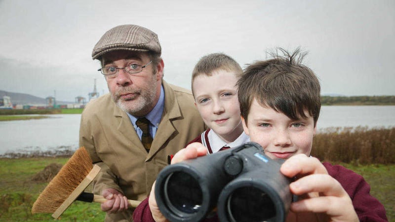 Pupils from Bunscoil Mhic Reachtain in north Belfast at the RSPB&rsquo;s Window on Wildlife nature reserve in Belfast Harbour Estate with actor Alan McKee who plays a janitor in a fun environmental presentation to the pupils Picture by Brian Thompson 