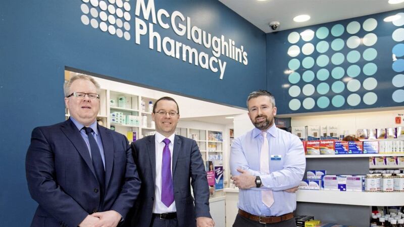 John O&rsquo;Brien, new co-owner of McGlaughlin&rsquo;s Pharmacy is pictured with Seamus McGuckin, head of business banking at First Trust Bank and Niall O&rsquo;Brien, his brother and co-owner of McGlaughlin&rsquo;s Pharmacy. 