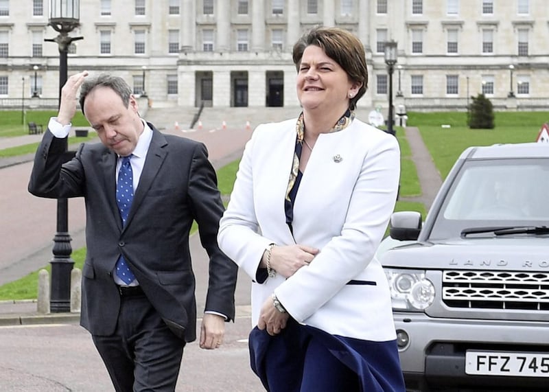 Arlene Foster and Nigel Dodds speak to the media outside Parliament Buildings. Picture by Justin Kernoghan 