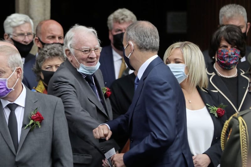 Austin Currie (left) greets Taoiseach Miche&aacute;l Martin at John Hume&#39;s recent funeral 