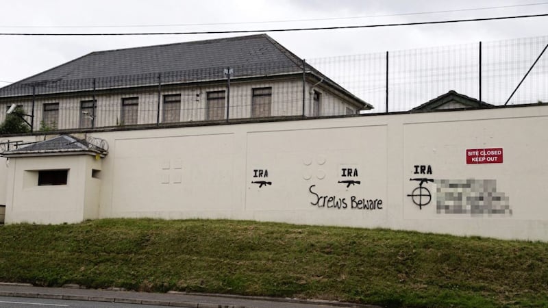 Threatening graffiti was daubed on the wall of the former Stewartstown PSNI station. Picture by John O&#39;Neill 
