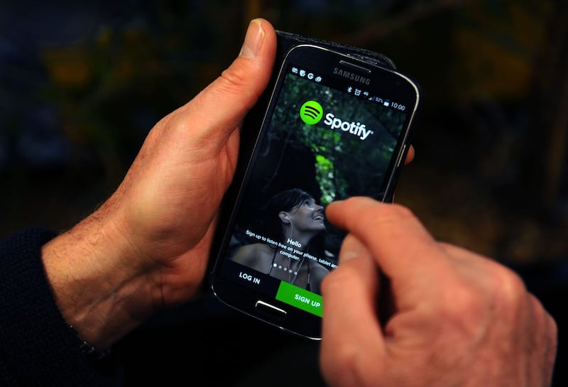 The Spotify App is shown on a Samsung smartphone.