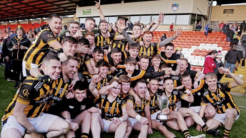 Crossmaglen players celebrate after retaining the Gerry Fegan Cup yesterday at the Athletic Grounds. Picture: Seamus Loughran. 