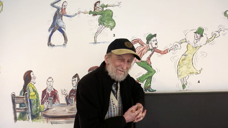 Irish News cartoonist Ian Knox views his work on display in the new IntoMedia offices in Belfast&#39;s College Street, where the newspaper, Q Radio and Interpress are headquartered. Picture by Mal McCann 