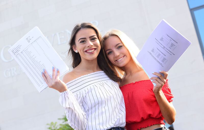 &nbsp;Hannah James and Victoria Gillespie pupils from Grosvenor Grammar School in Belfast, Northern Ireland pictured after  receiving their GCSE results..Picture by Pacemaker.