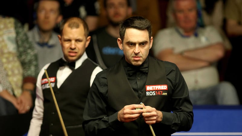 Barry Hawkins and Ronnie O'Sullivan during day nine of the Betfred Snooker World Championships at the Crucible<br />Picture by PA&nbsp;