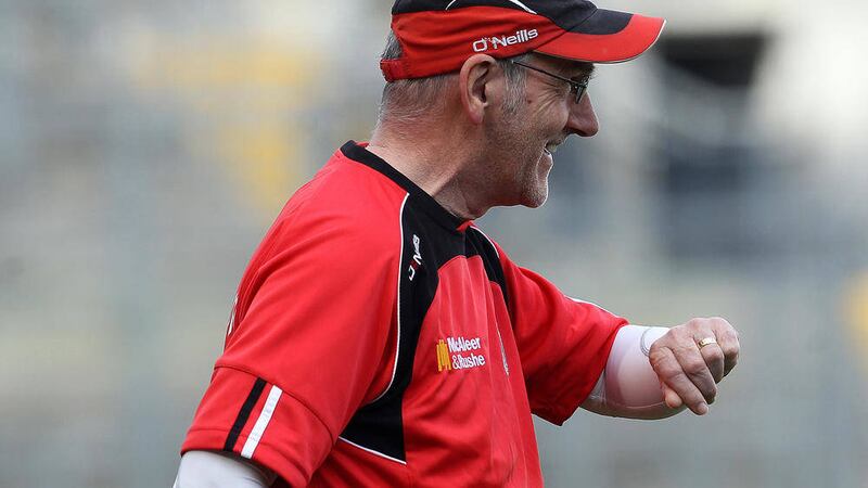 Tyrone manager Mickey Harte guided the Red Hands to wins over Kerry in 2003, 2005 and 2008 