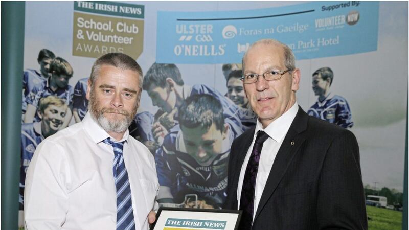 KILLEEVAN Sarsfields, Monaghan PRO and Irish Language Officer Brian MacUaid accepted the &lsquo;Club Initiative of the Year&rsquo; gong at the Irish News&rsquo;s Schools, Club and Volunteer awards from Sean O&rsquo;Coinn of Foras na Gaeigle 