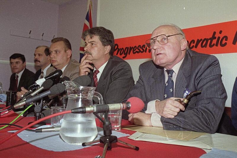 Former UVF leader Gusty Spence, along with William Smyth, Gary McMichael, David Ervine and David Adams, announces the combined loyalist ceasefires in 1994 