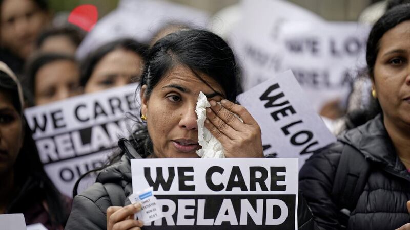 Migrant healthcare workers held a protest at the D&aacute;il about low pay rates that keep them separated from their families 