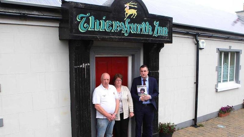 Peter McCarthy, Mary Sloan and solicitor Gavin Booth outside the Thierafurth Inn where Mary&#39;s brother Peter McCormack was murdered in 1992. Picture by Matt Bohill 
