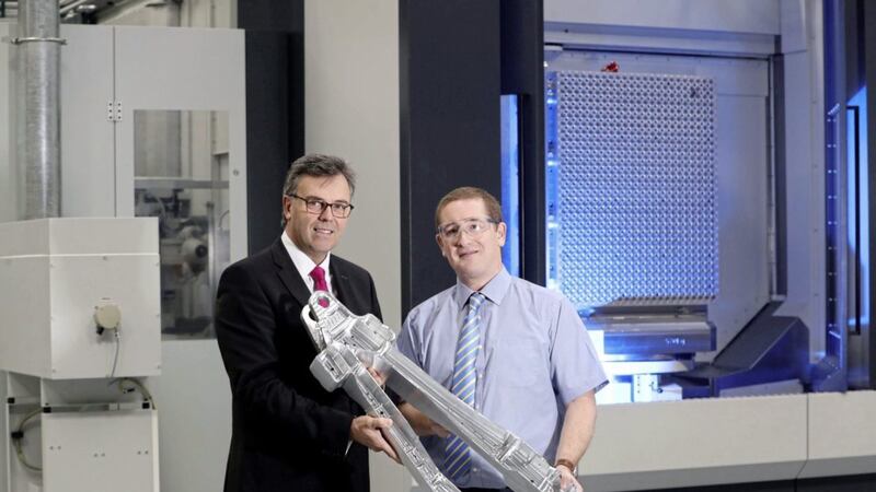 Invest NI chief executive Alastair Hamilton (left) with Mark Semple of Moyola Precision Engineering 
