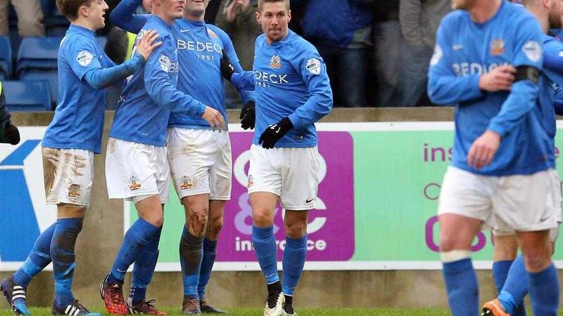 Glenavon's Eoin Bradley celebrates with his team-mates after scoring during Saturday's 3-3 draw with Cliftonville at Mourneview Park <br />Picture by Pacemaker