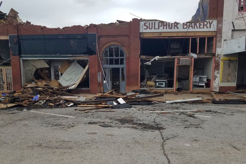 A row of buildings damaged by a tornado in Sulphur (Ken Miller/AP)