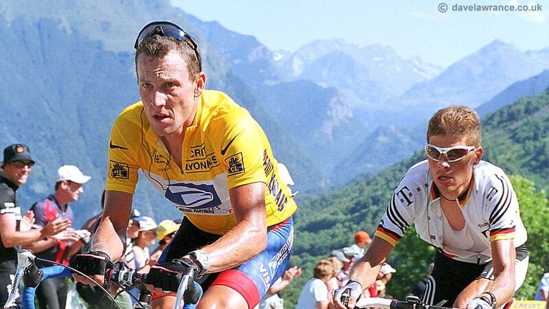 Disgraced cyclist Lance Armstrong (left)