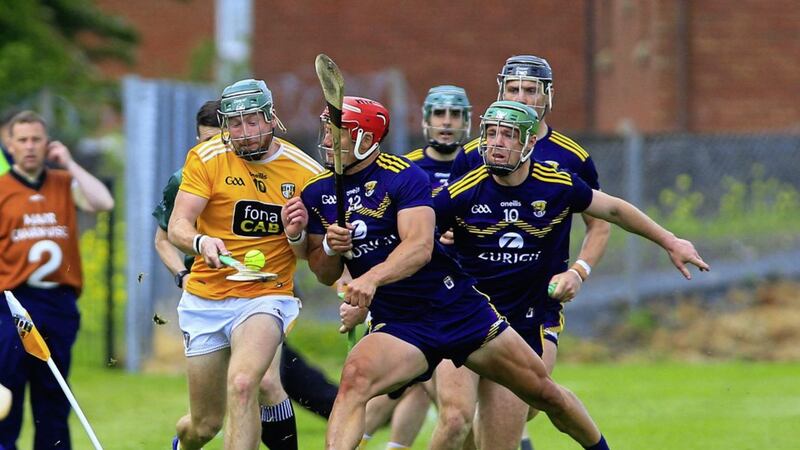 Niall McKenna in against Wexford&#39;s Lee Chin and Aidan Nolan during last season&#39;s pulsating draw at Corrigan Park Picture: Seamus Loughran 