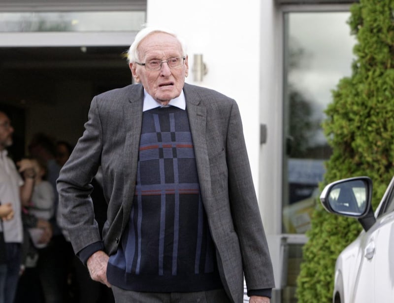 Wrightbus founder, Sir William Wright, leaving the Green Pastures Church yesterday. Picture by Ann McManus. 