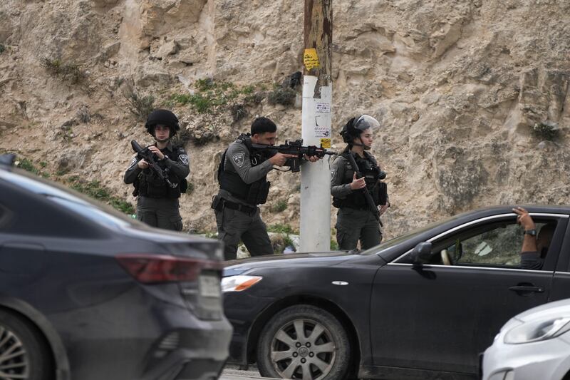 Israeli security forces secure the site where an alleged Palestinian teenage attacker was shot outside the Israeli settlement of Maale Adumim, in the West Bank (Mahmoud Illean/AP)