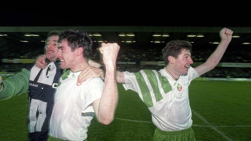 John Aldridge, Alan McLoughlin and Denis Irwin celebrate after qualifying for the 1994 World Cup Finals after the Republic of Ireland played Northern Ireland at Windsor Park in November1993 