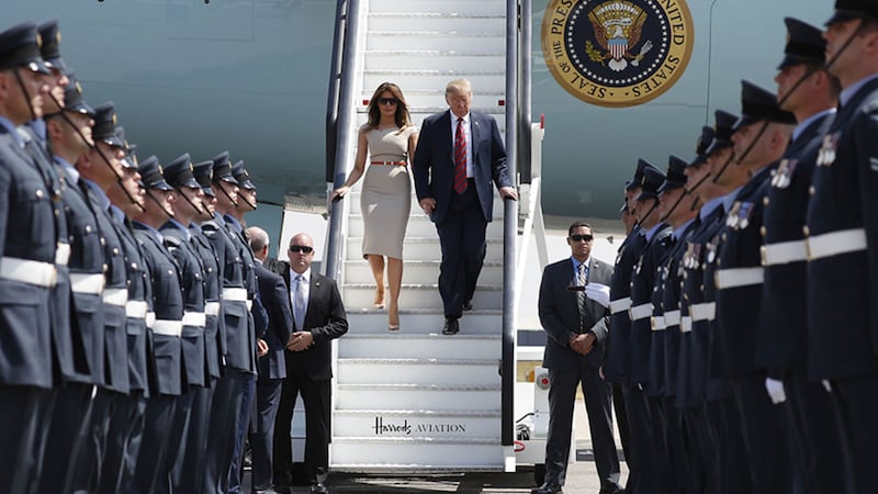 Donald and Melania Trump step off Air Force One on their arrival at London's Stansted Airport yesterday&nbsp;
