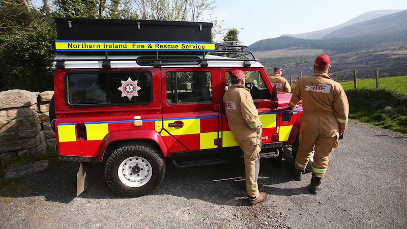 NIFRS crews watch for gorse fires in the Mournes this afternoon. Picture by Mal McCann&nbsp;