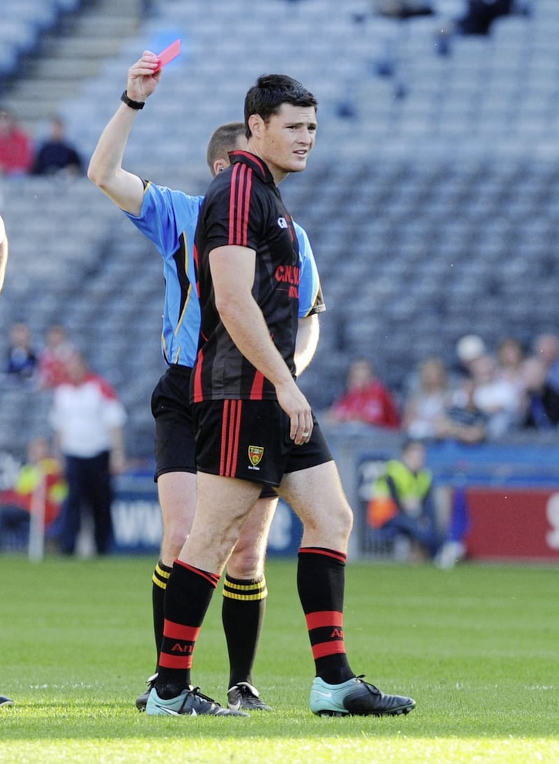 Clarke is shown a red card by referee Michael Duffy in in last-ever appearance for Down in July 2011. Picture by Declan Roughan