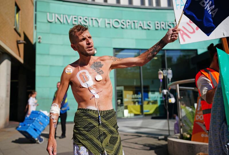 Patient Luke Rovira joining striking junior doctors from the British Medical Association on the picket line outside Bristol Royal Infirmary on Wednesday