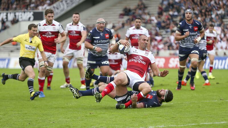 Ruan Pienaar is pulled down just short of the line by Luke Jones during the opening round of the European Rugby Champions Cup clash between Bordeaux and Ulster at Stade Chaban Delmas <br />Picture by John Dickson