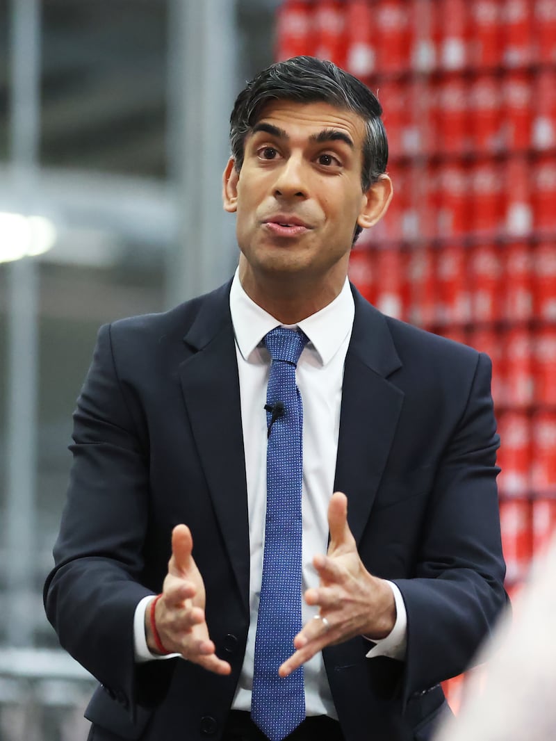 Prime Minister Rishi Sunak holds a Q&A session with business leaders during a visit to Coca-Cola HBC in Lisburn last February