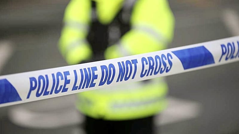 Families were moved from their homes in the Dunmurry area as police searched for an explosive device 
