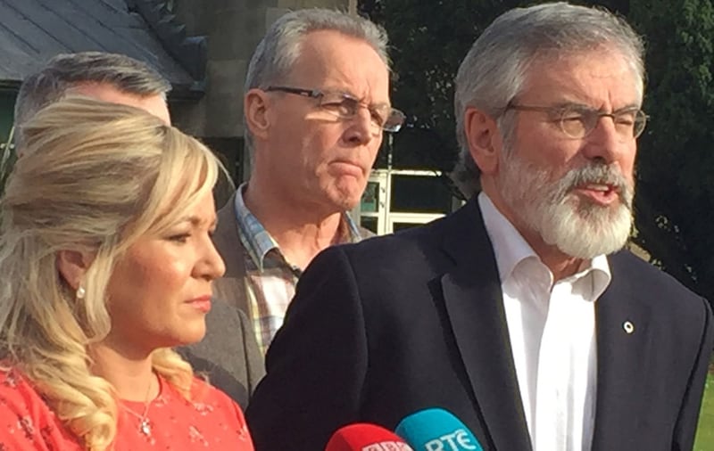 Sinn Fein's leader at Stormont Michelle O'Neill and the party's president Gerry Adams speak to the media at Stormont Castle in Belfast, as powersharing talks have broken down after Sinn Fein withdrew&nbsp;