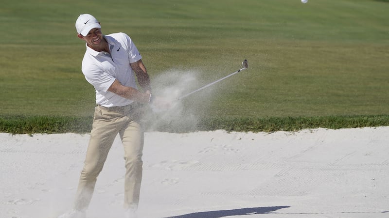 Rory McIlroy hits a shot from the sand trap on the sixth hole during the third round of the Arnold Palmer Invitational golf tournament Saturday. After lead. After leading after day one following a seven-under round of 65, the Holywood man is now four shots off the lead heading into Sunday's final round<br />Picture: John Raoux/AP&nbsp;