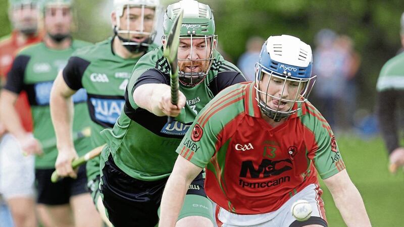Lavey&rsquo;s Liam Murphy in action against James Cunningham of Patrick Sarsfield&rsquo;s in the Ulster IHC semi-final 