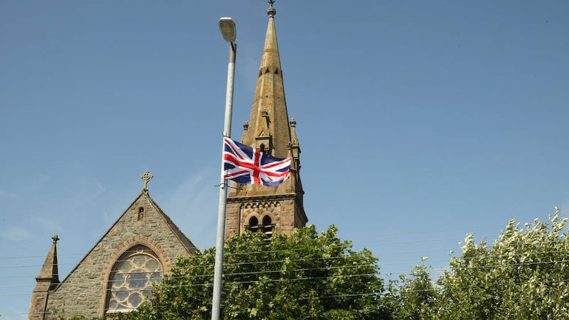 Independent coun Patrick Clarke who reptesents Dundrum after the Union Jack flying outside the church in the village picture Bill smyth. 