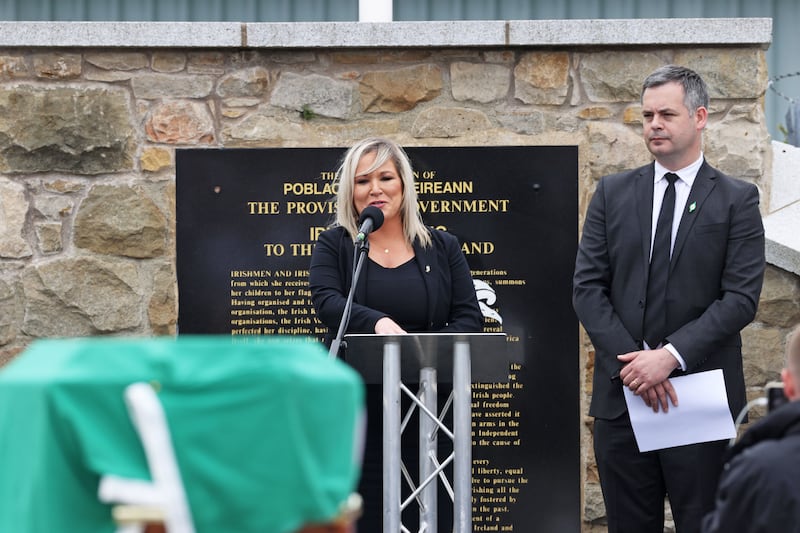 &nbsp;Deputy First Minister Michelle O'Neill speaks alongside Sinn Fein TD Pearse Doherty during the funeral of senior Irish Republican and former leading IRA figure Bobby Storey at Milltown Cemetery in west Belfast.