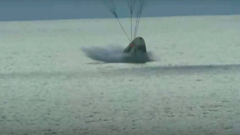 The SpaceX capsule carrying four space tourists landed in the Atlantic after three days in orbit.