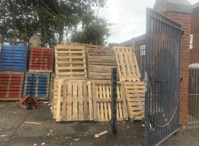 Pallets are the main building blocks for 11th Night bonfires, often collected and stored months in advance.