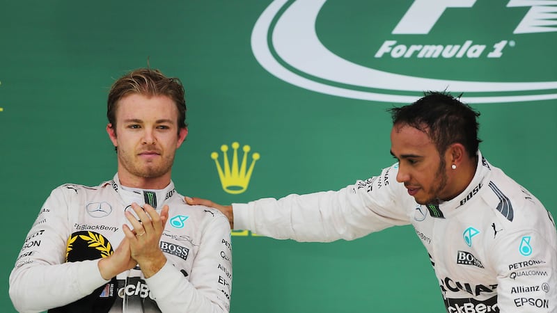 Mercedes' Lewis Hamilton acknowledges team-mate Nico Rosberg (left) after winning the 2015 Formula One World Championship at the US Grand Prix at the Circuit of The Americas in Austin, Texas last Sunday<br />Picture: PA&nbsp;