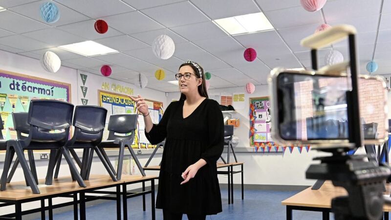 History teacher Caitlin Ni Ruanaidh prepares some online lessons at Col&aacute;iste Feirste. Picture by Colm Lenaghan/Pacemaker 
