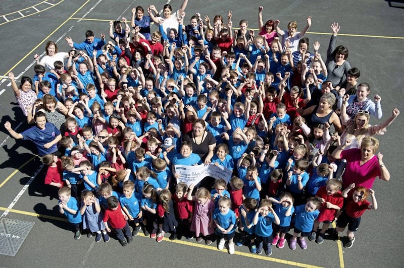 The pupils and staff of St Mary's Primary School say goodbye to Tatiana as she finishes P7. Picture by Mark Marlow
