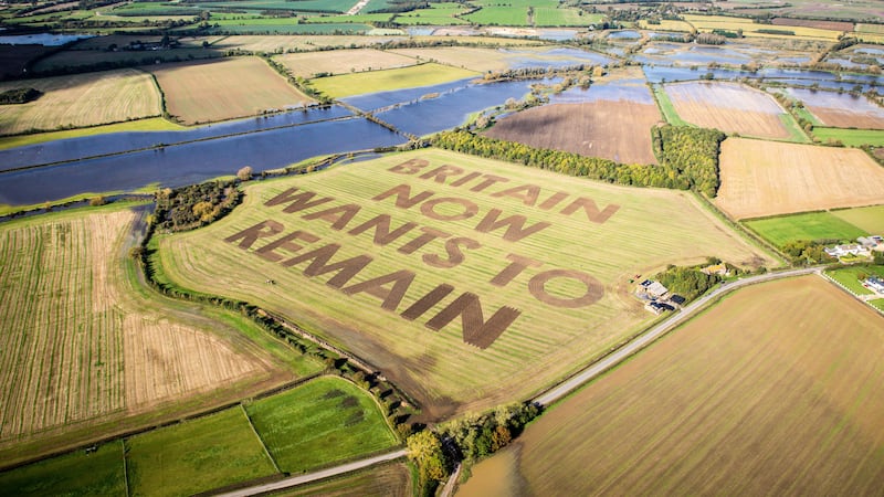 Campaign group Led By Donkeys ploughed 40 metre high letters into a field in Wiltshire.