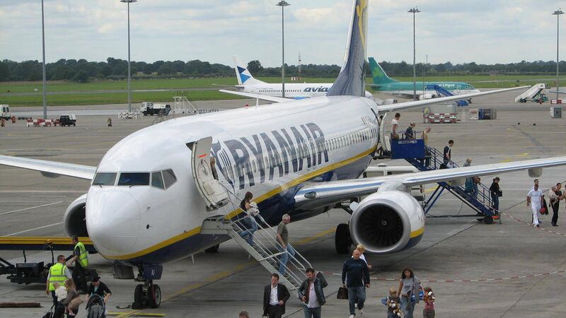 Passengers leaving a Ryanair aircraft at Dublin airport. The carrier confirmed yesterday that its profits are up again 